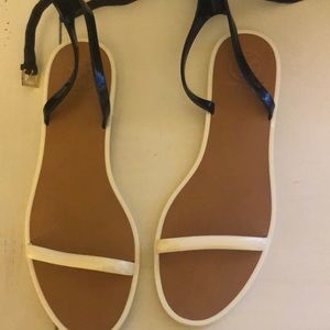 Black and white jelly Tory Burch sandals